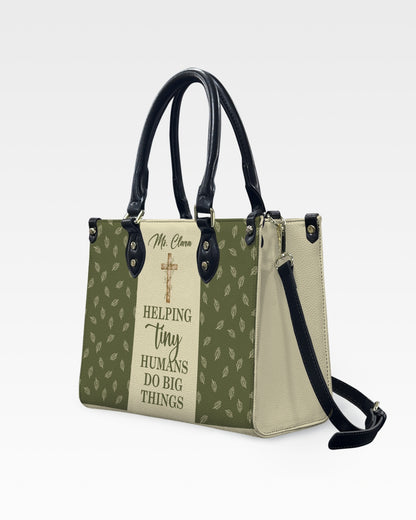 Helping Tiny Humans Do Big Things Leather Handbag