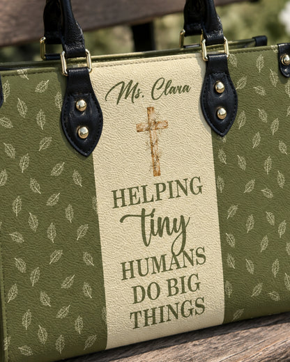 Helping Tiny Humans Do Big Things Leather Handbag