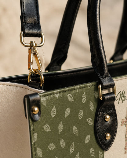 Helping Tiny Humans Do Big Things Leather Handbag