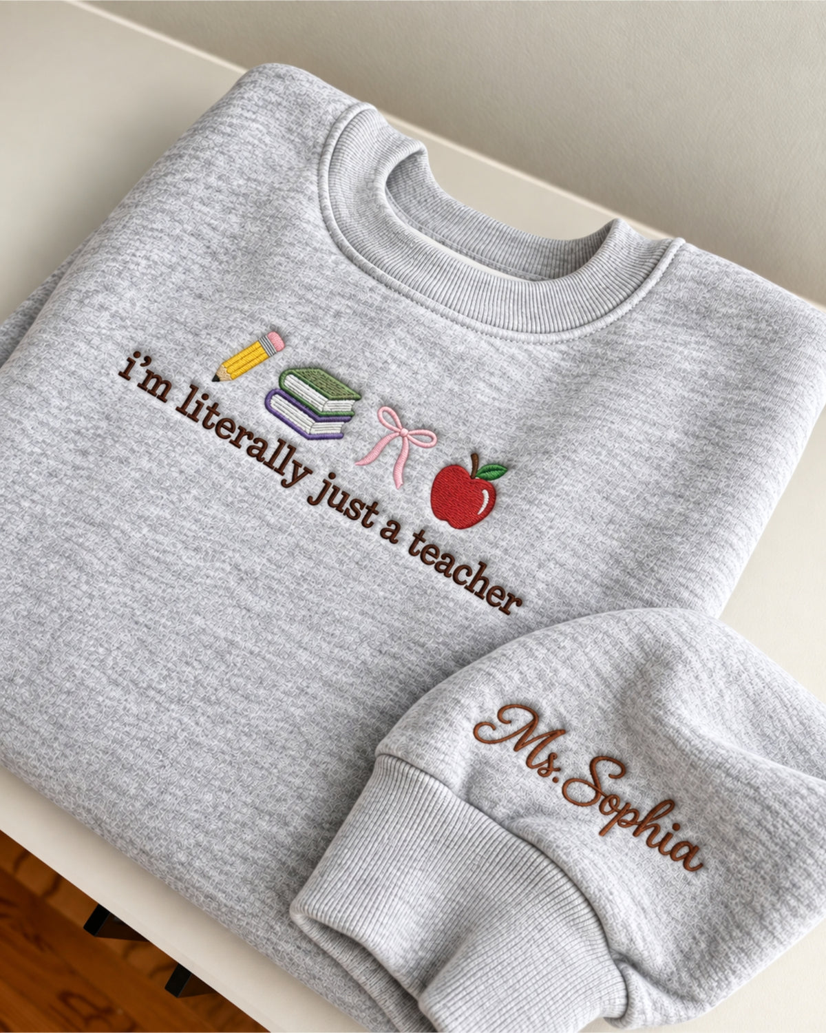 I'm Literally Just a Teacher Embroidered Sweatshirt — mockup 4