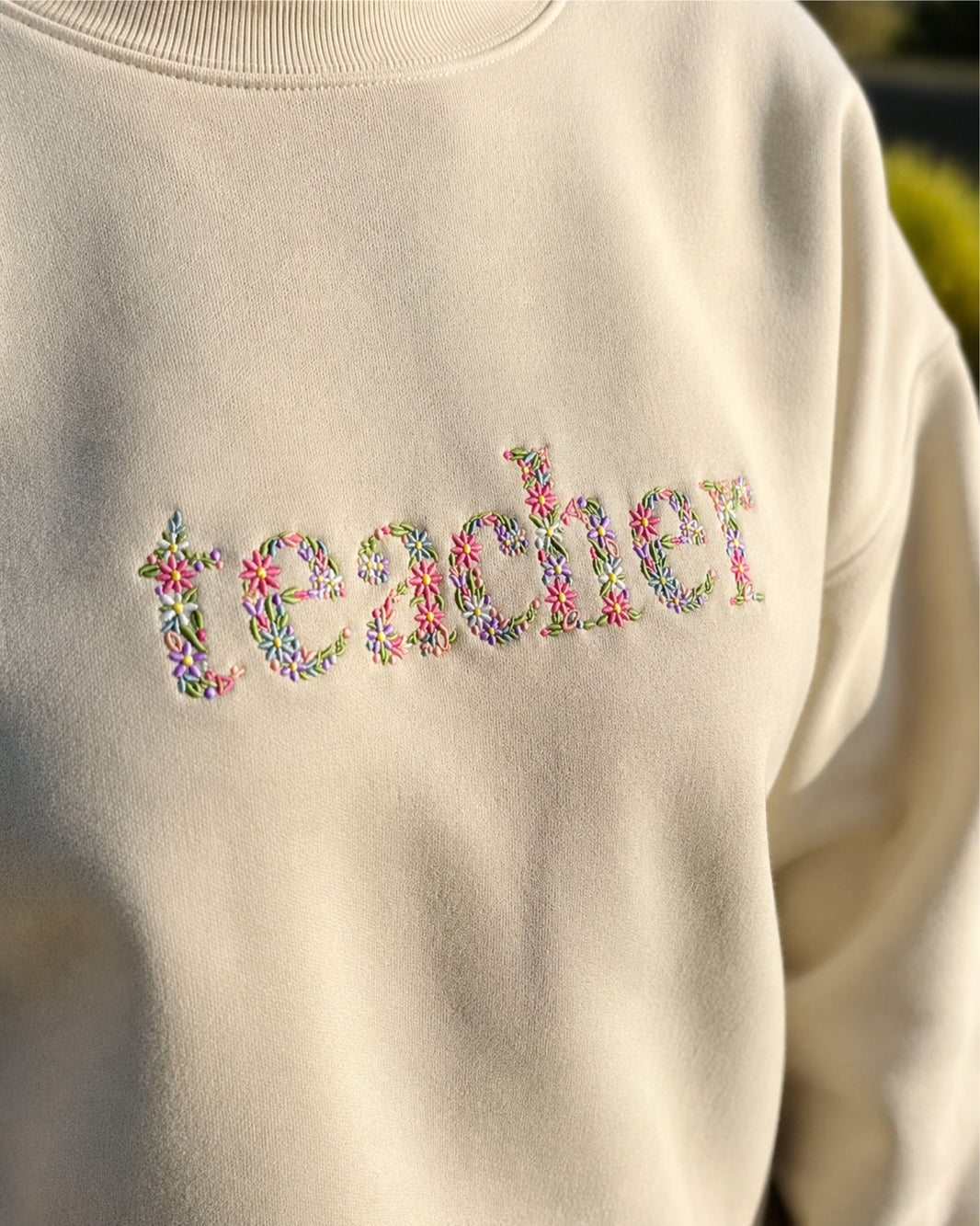 Personalized Floral Teacher Embroidered Sweatshirt mockup 1
